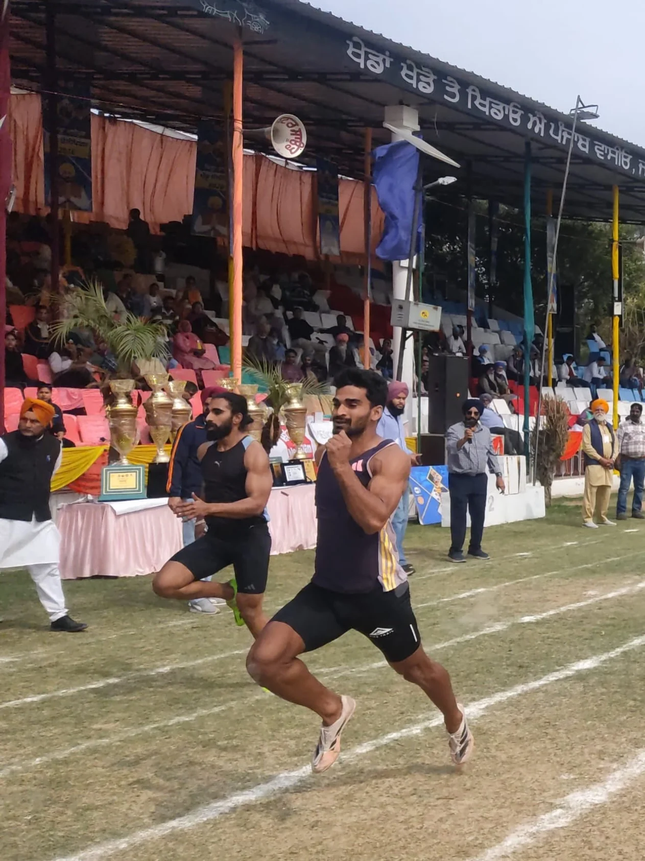 Photo by 1000 Things In Ludhiana on February 18, 2026. May be an image of ‎track and field, stadium and ‎text that says '‎לס ਖਡਾ ਖਰ ਤੇ ਖਿਡਾਓ ਐੇ ਪੰਜਾਬ ਵੇਸाਓ,‎'‎‎.