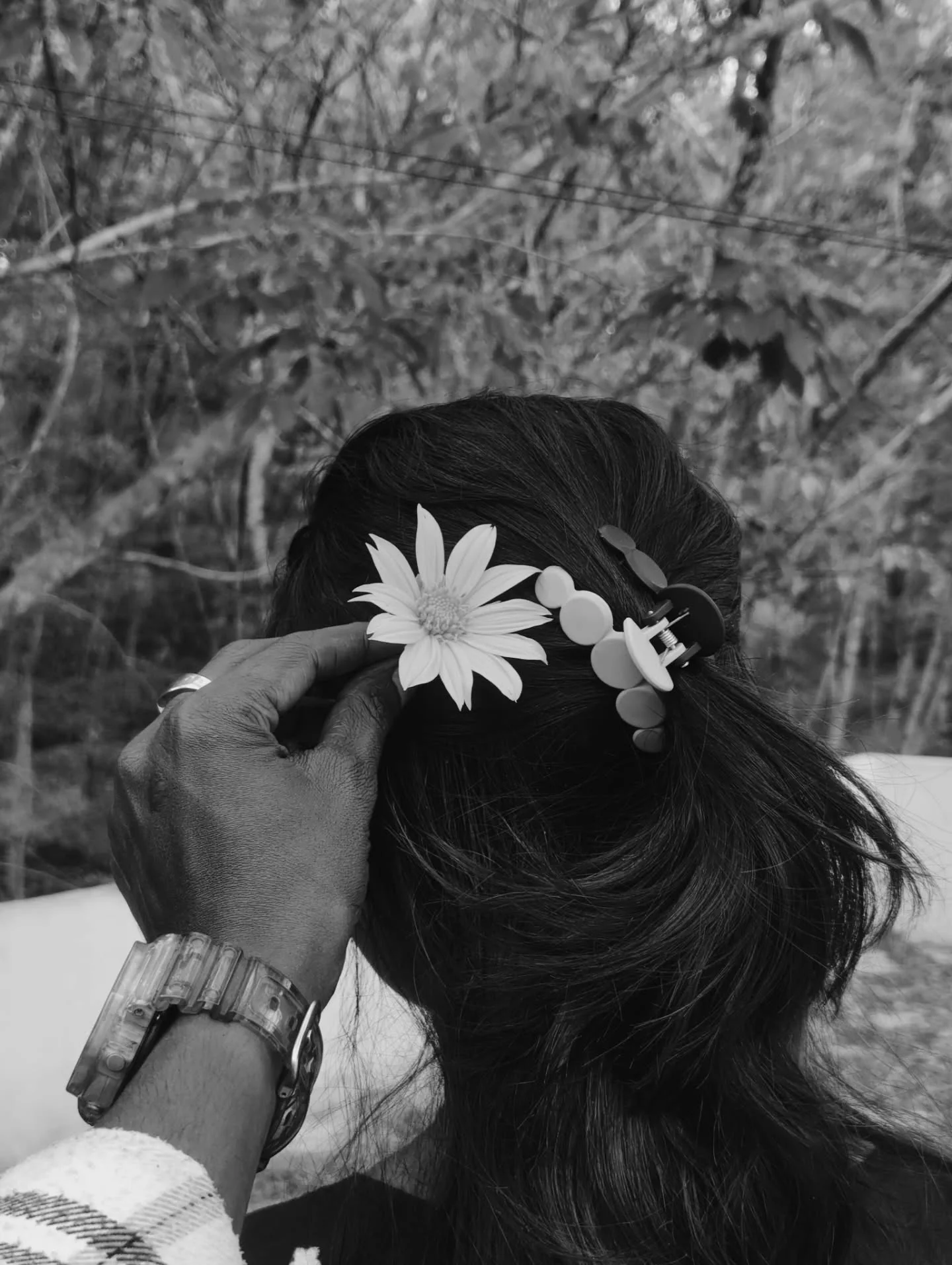 Photo by Jyothi🎀 on February 14, 2026. May be a black-and-white image of barrette, flower and text.