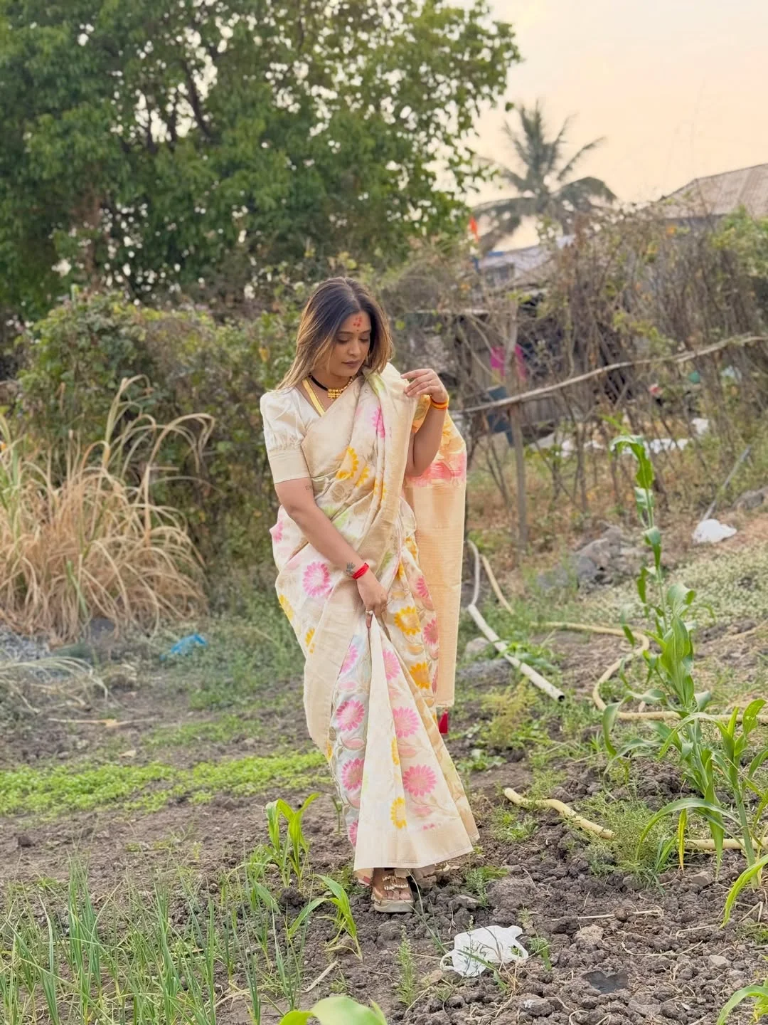 Photo shared by Aarti on February 17, 2026 tagging @aarti_thorve29. May be an image of smiling, plant, grass, picnic and text.