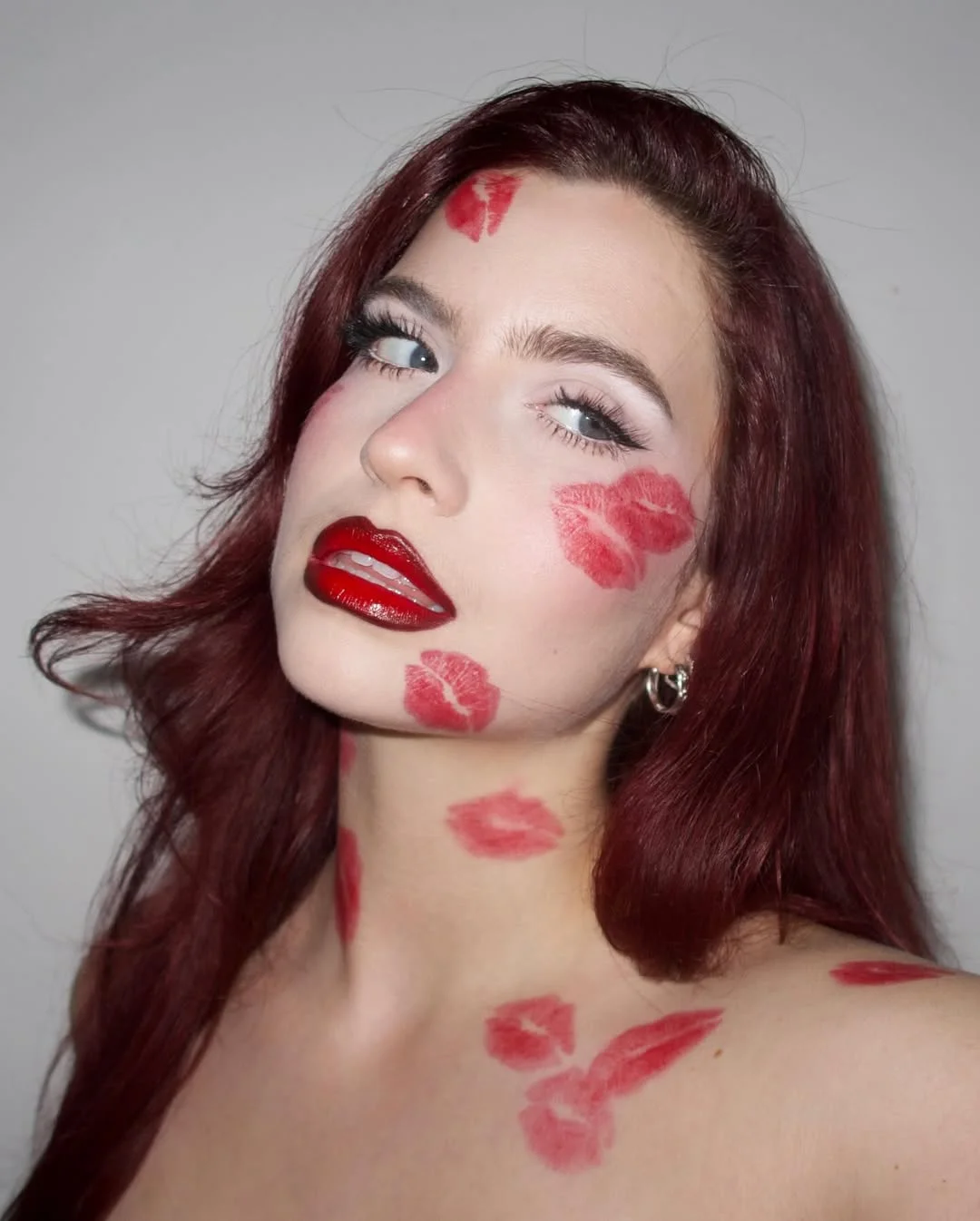 Photo by Abby Roberts on February 14, 2026. May be a closeup of one or more people, makeup, lipstick and text.