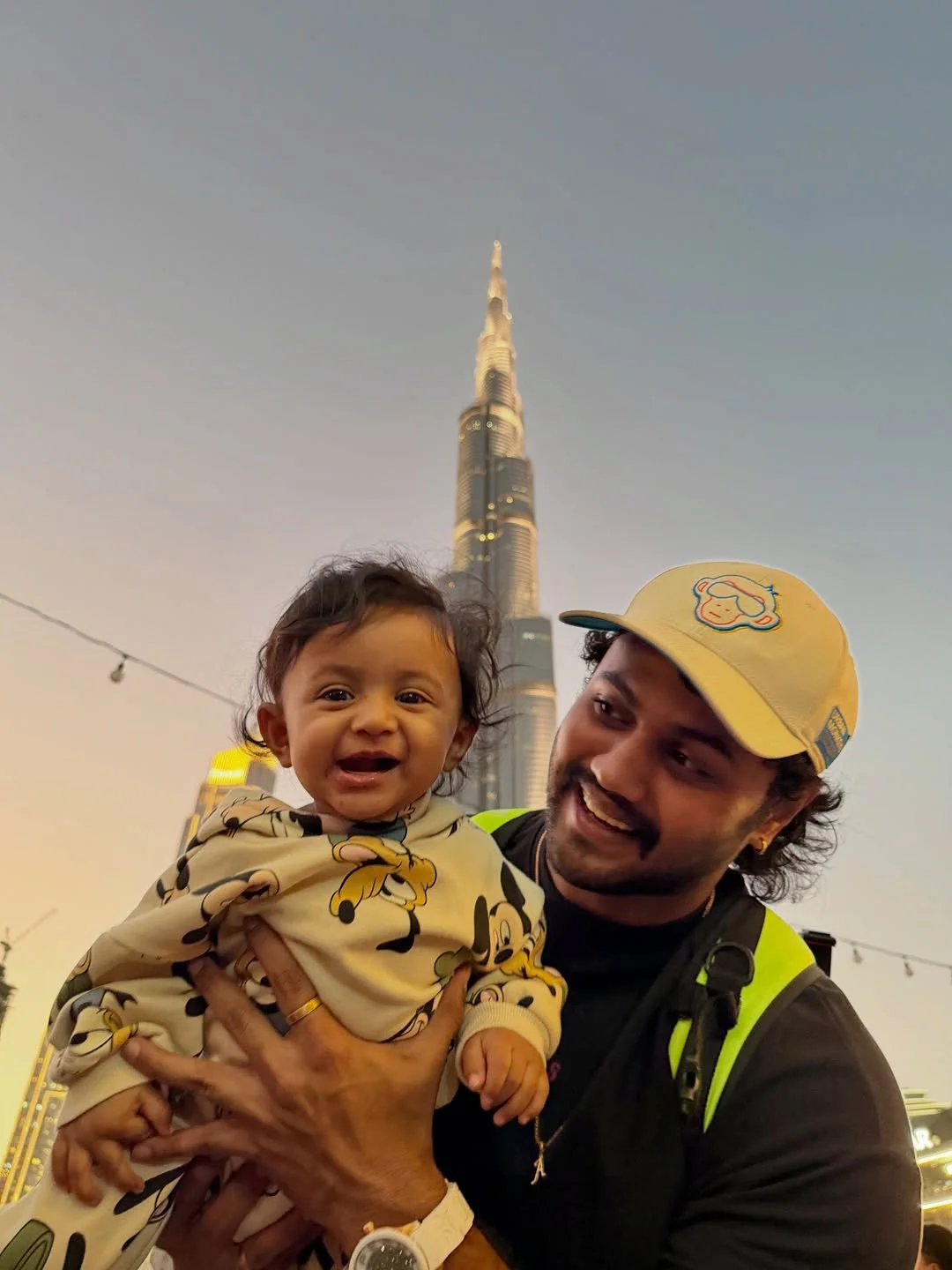 Photo by Avinash Ashok on February 18, 2026. May be an image of baby, skyscraper, tower and text.