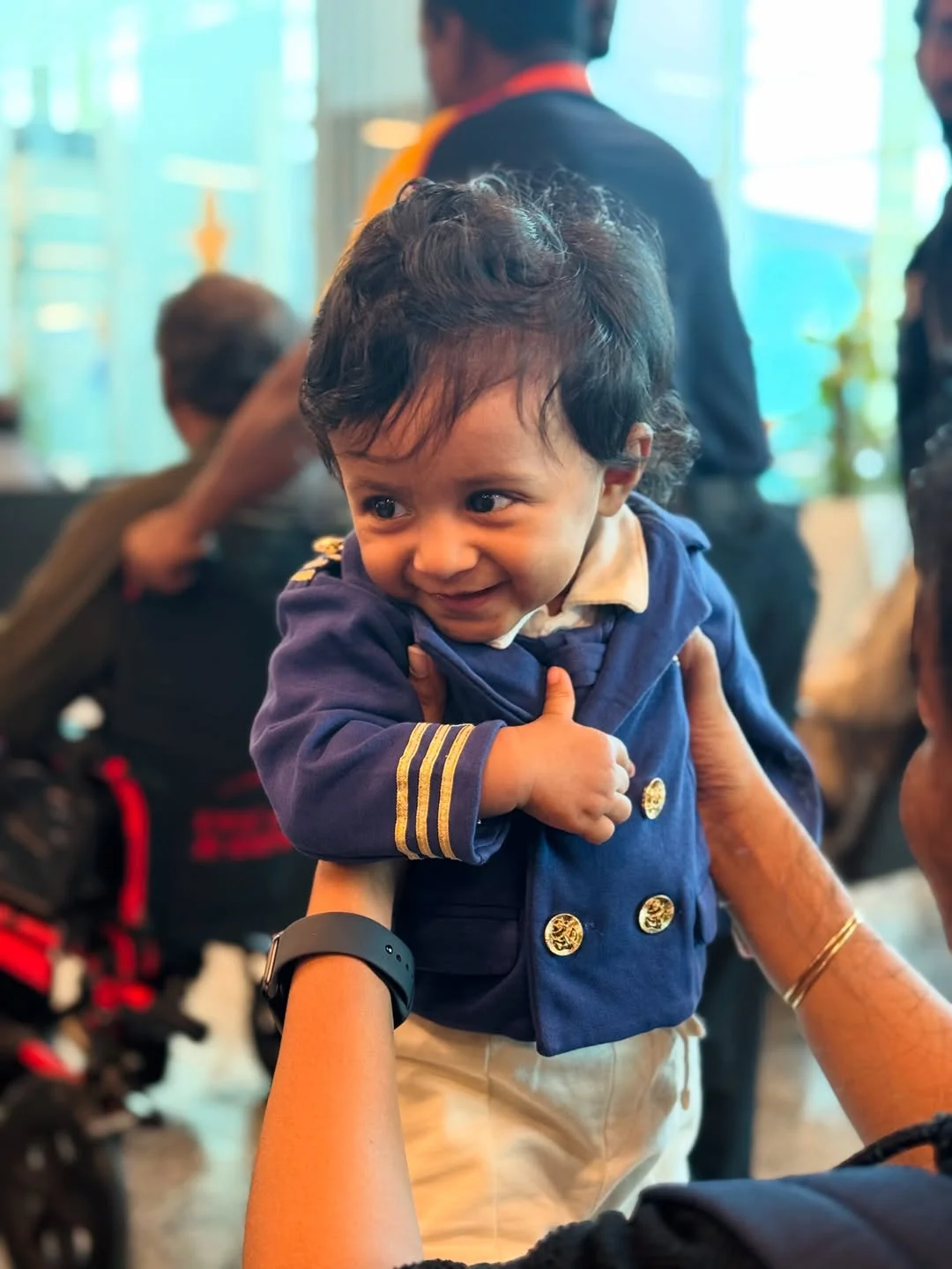 Photo by Avinash Ashok on February 15, 2026. May be an image of baby, smiling, standing and text.