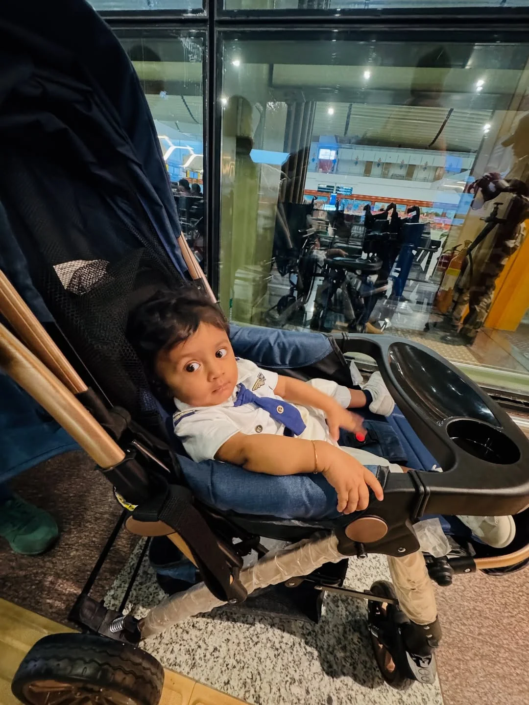 Photo by Avinash Ashok on February 15, 2026. May be an image of baby, scooter, buggy and text.