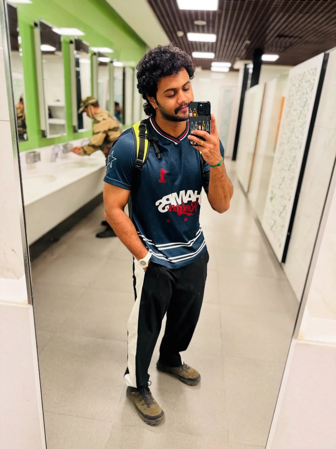 Photo by Avinash Ashok on February 15, 2026. May be a selfie of one or more people, beard, biceps, sweatpants, mirror, sportswear and text.