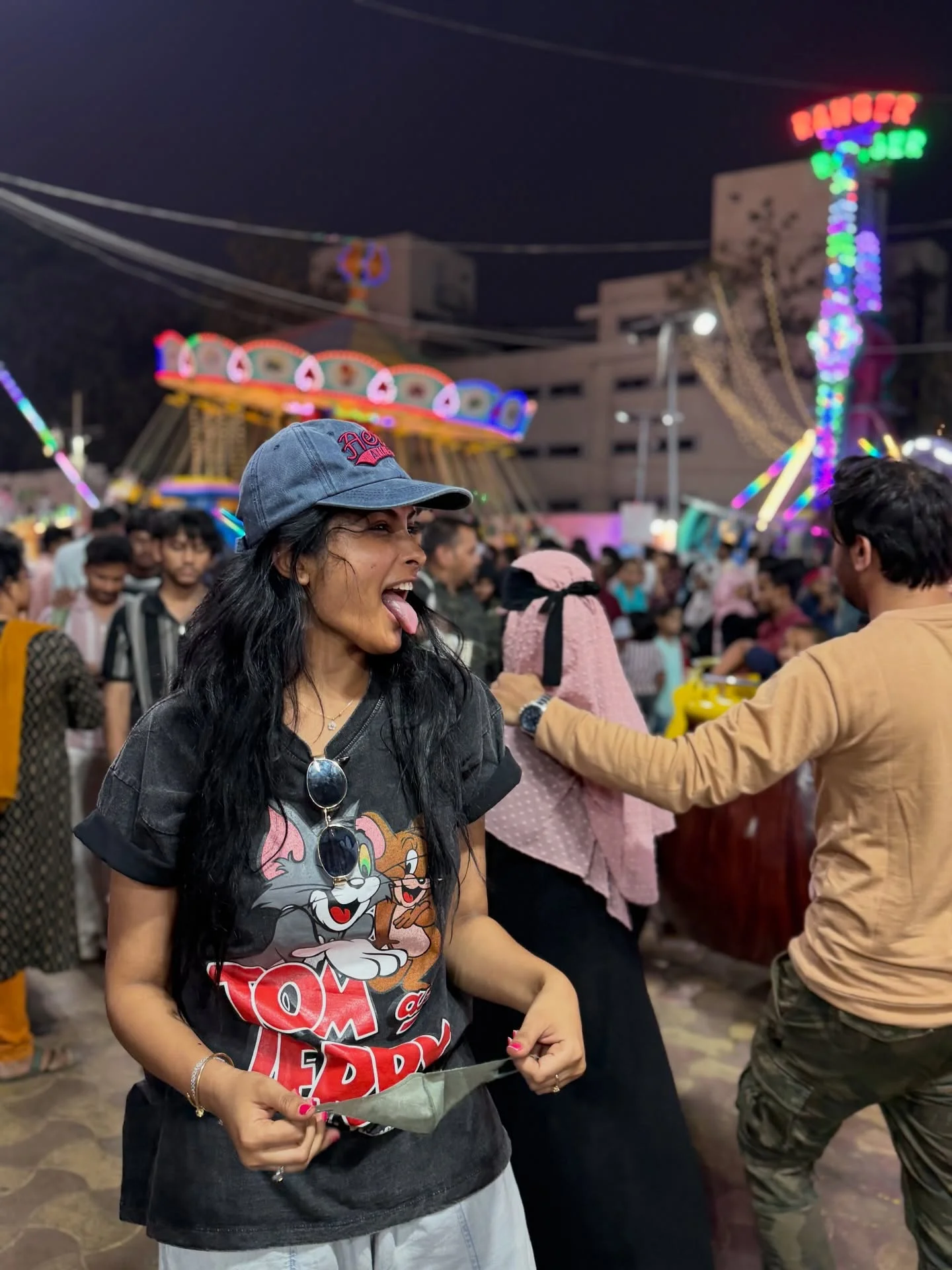 Photo by Divi on February 15, 2026. May be a selfie of one or more people, people smiling, outdoors, night and text.