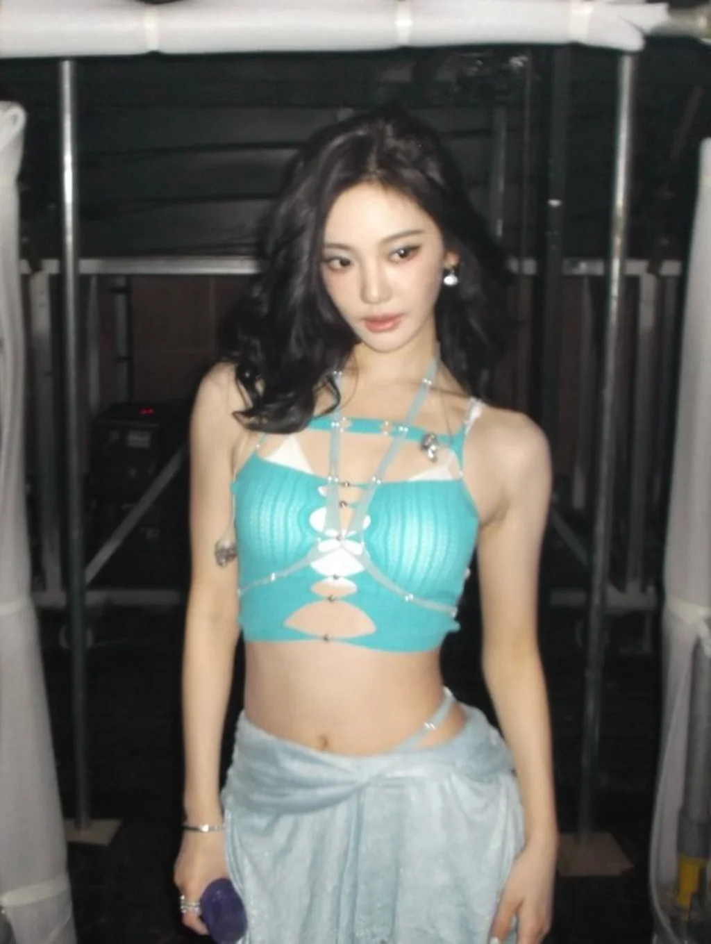 Photo by aespa 에스파 FANPAGE on February 14, 2026. May be an image of one or more people, hair, bra, top and text.