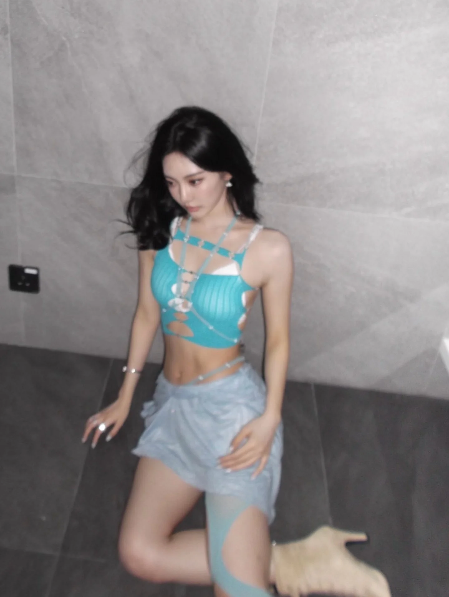 Photo by aespa 에스파 FANPAGE on February 14, 2026. May be an image of one or more people, hair, slip, sleepwear, top, miniskirt, bra, dress and text.