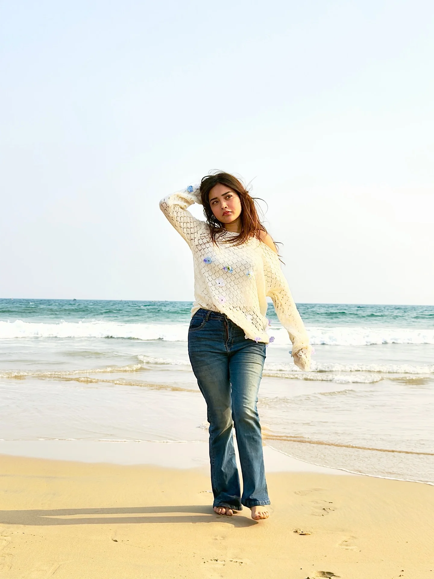 Photo by Aimi Gogoi on February 15, 2026. May be an image of ocean, water, beach, coast and text.