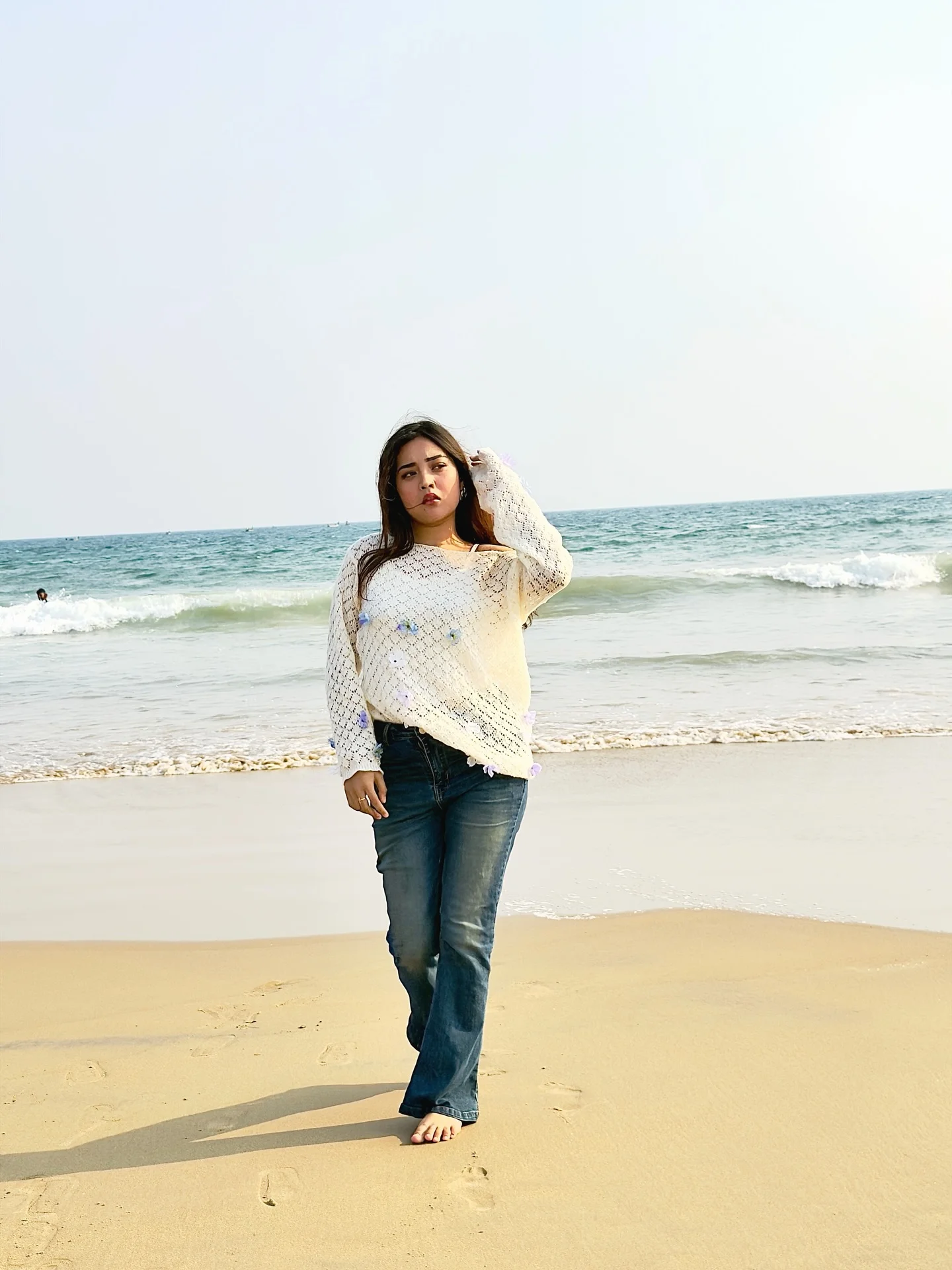 Photo by Aimi Gogoi on February 15, 2026. May be an image of one or more people, beach, ocean, coast and text.