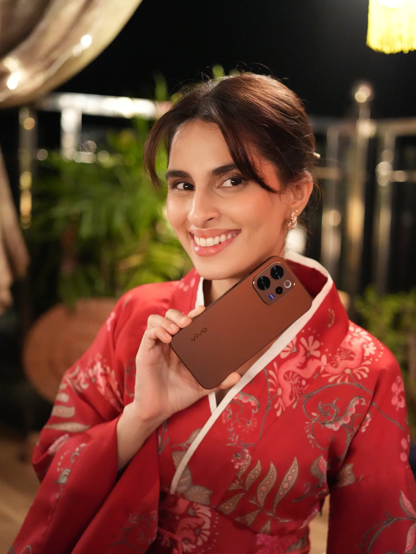 Photo shared by Aisha Ahmed 🦩 on February 13, 2026 tagging @vivo_india. May be a selfie of one or more people, makeup, phone, screen, tablet and text.