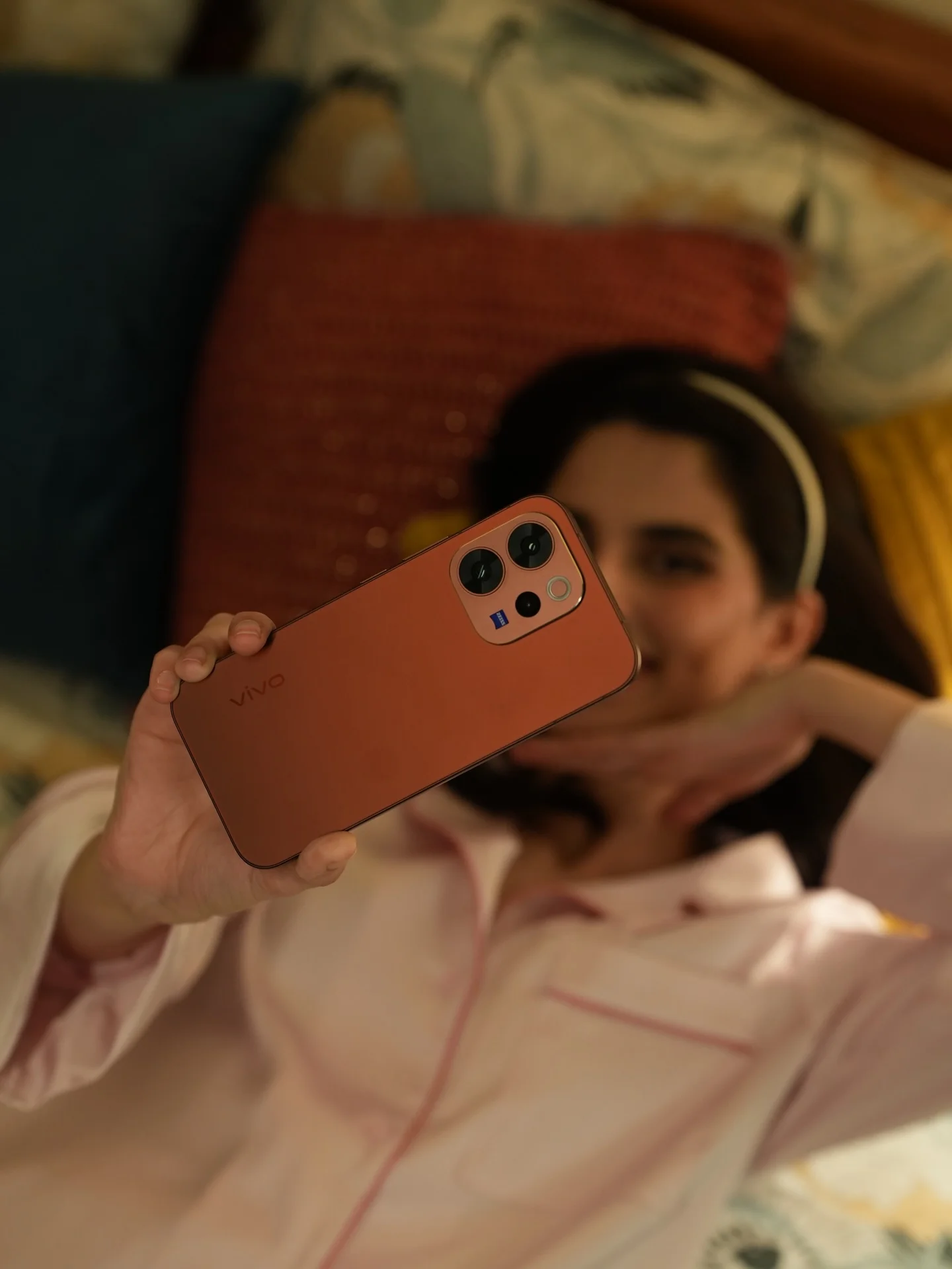 Photo by Aisha Ahmed 🦩 on February 13, 2026. May be an image of phone, sleepwear, screen, camera, bath robe, tablet and text.