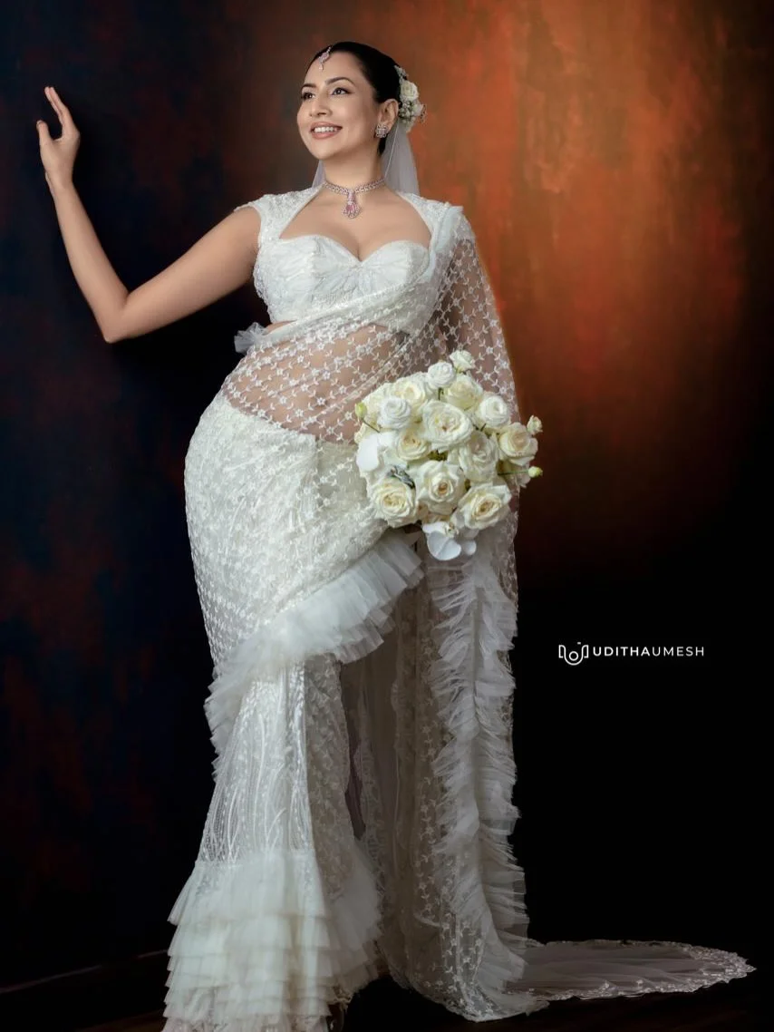 Photo by Amanda Silva on March 21, 2026. May be an image of gown, dress, wedding and text.