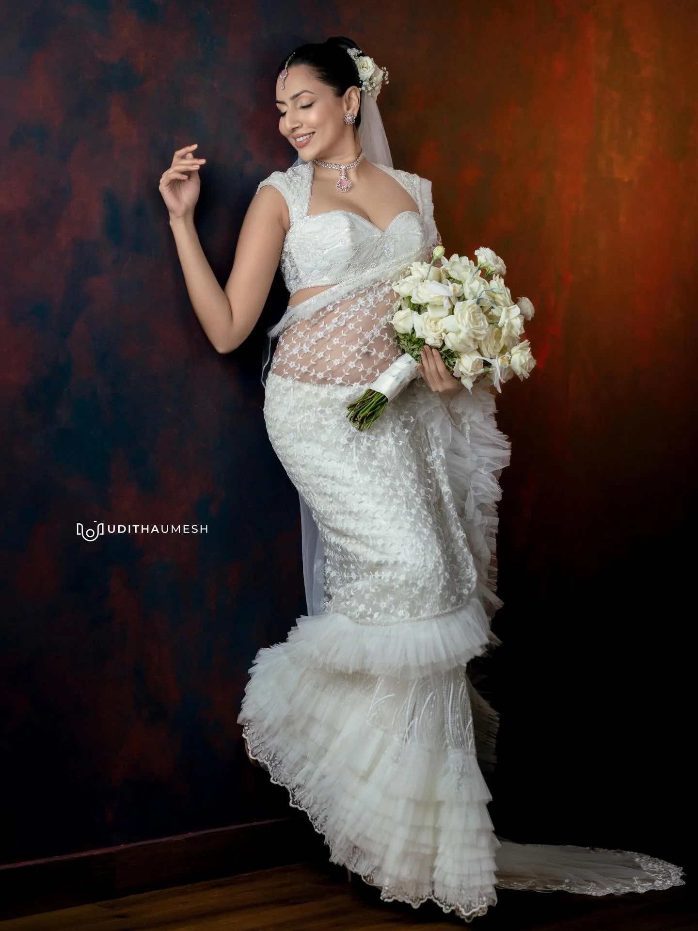 Photo by Amanda Silva on March 21, 2026. May be an image of dress, gown, prairie gentian, wedding and text.