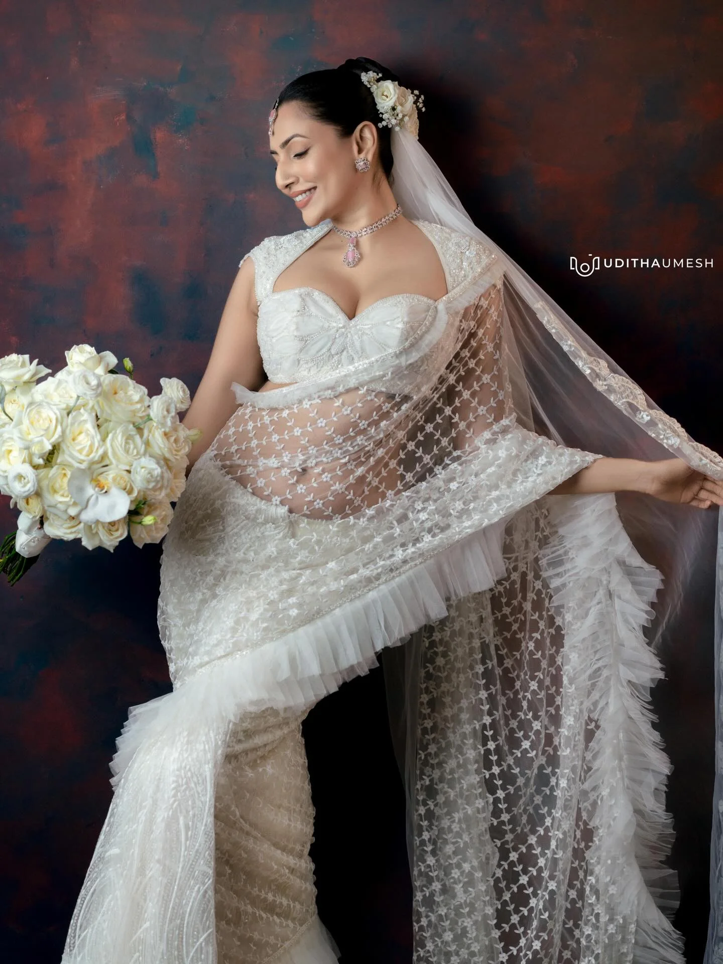 Photo by Amanda Silva on March 21, 2026. May be an image of gown, wedding and text.