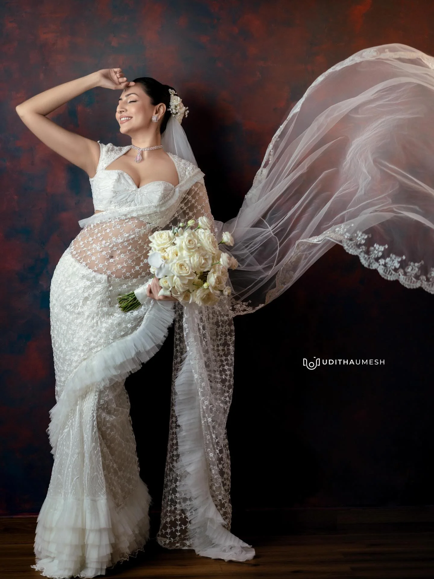 Photo by Amanda Silva on March 21, 2026. May be an image of gown, dress, prairie gentian, wedding and text.