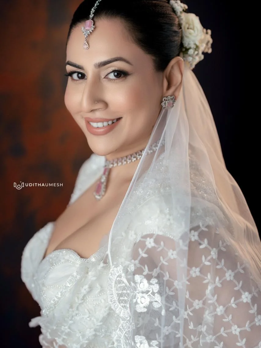 Photo by Amanda Silva on March 21, 2026. May be an image of one or more people, makeup, wedding and text.