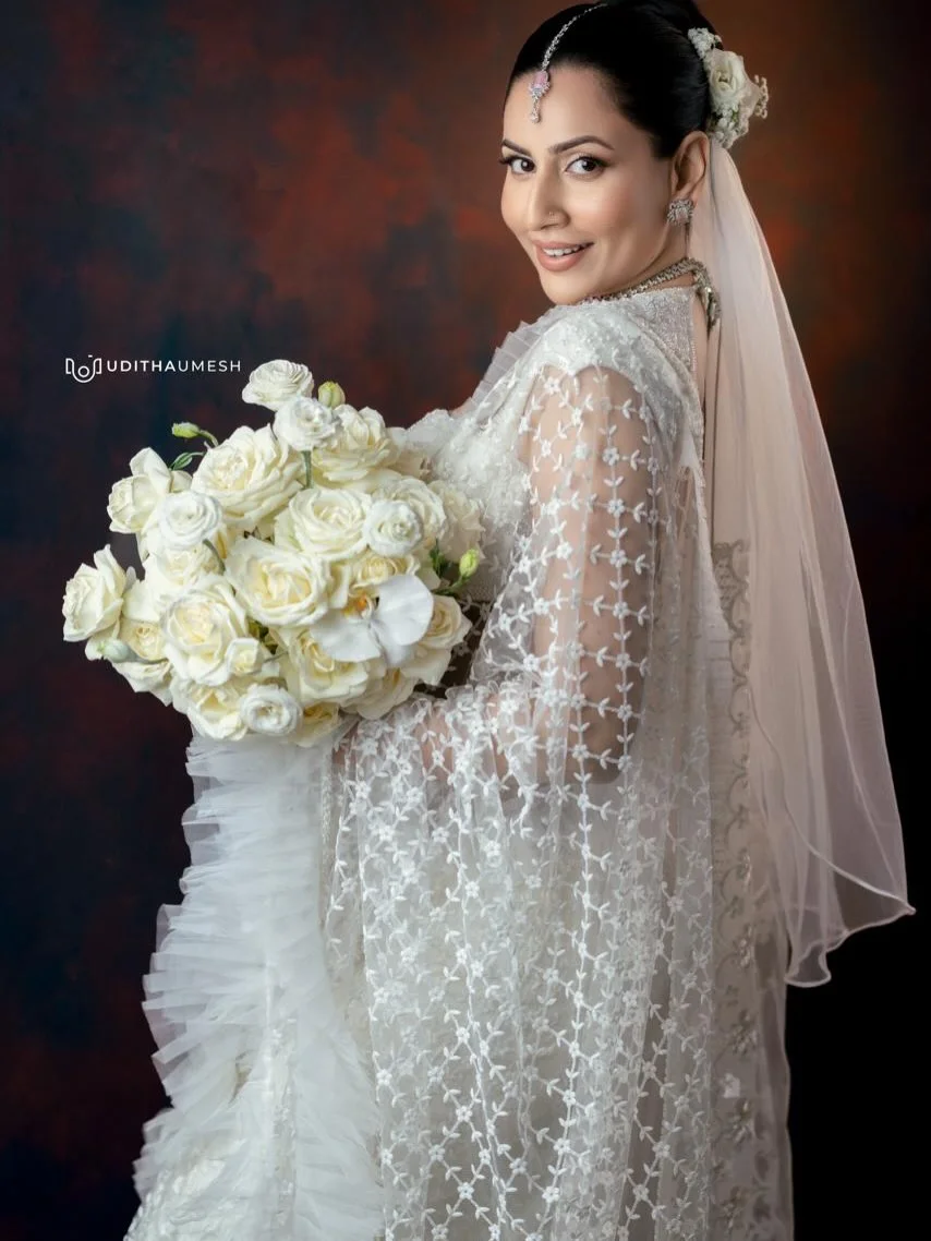 Photo by Amanda Silva on March 21, 2026. May be an image of bouquet, dress, prairie gentian, wedding and text.