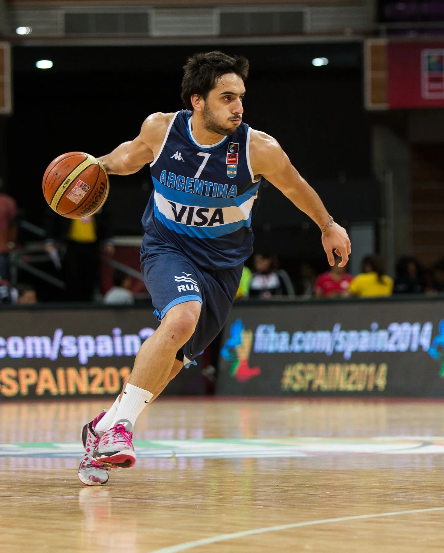 Photo by FIBA AmeriCup on March 25, 2026. May be an image of basketball, ball, basketball court and text that says '7日 - ARGENTINA E4 VISA RUS om/spain SPAIN20 ល.ប2014 #SPAIN2014'.