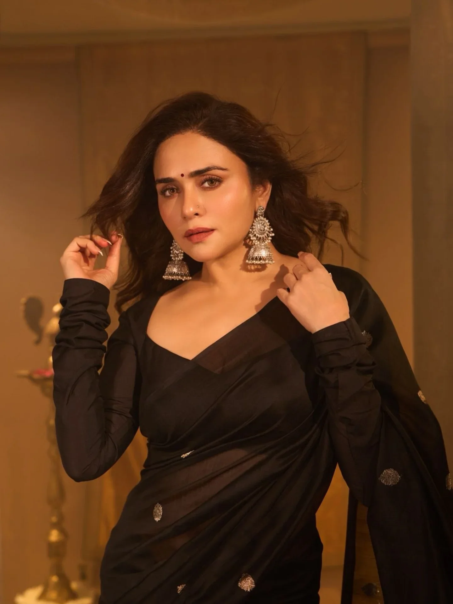 Photo shared by A M U L Y A by Amruta on March 23, 2026 tagging @amrutakhanvilkar, and @chandrakalm_jewellery. May be an image of net and text.